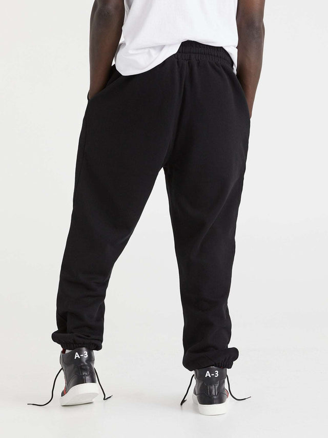 Black trackies sweatpants christian streetwear
